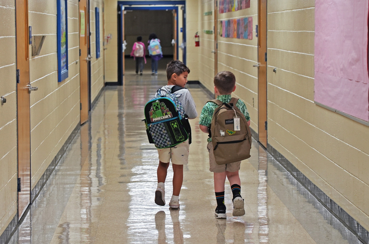 Students walking through a Berkeley County school hallway
